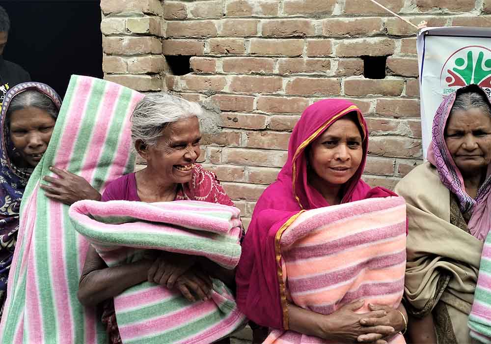 Distribution of Blankets among Poor cold people